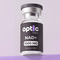 A clear Optic Labs NAD+ 1000mg vial labeled "Purity ≥ 99%" rests on a purple surface with a light purple background, highlighting high-purity NAD+ trusted by Australian scientists. Optic Labs Au